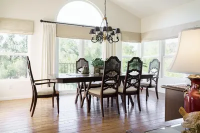 a dining room with a table and chairs at Luxury Home with Heated Pool - Spa and Lighted Pickle Ball Court in San Diego
