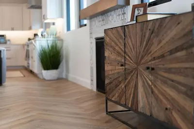 a wooden door in a kitchen with a fireplace at Enchanting Encinitas Oceanview Casita in Encinitas