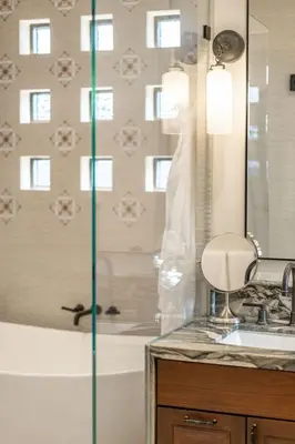 a bathroom with a shower and a sink and a tub at Enchanting Encinitas Oceanview Casita in Encinitas