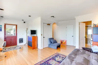 a living room with a couch and a tv at Belle View Laguna Beach Getaway with Patio in Laguna Beach