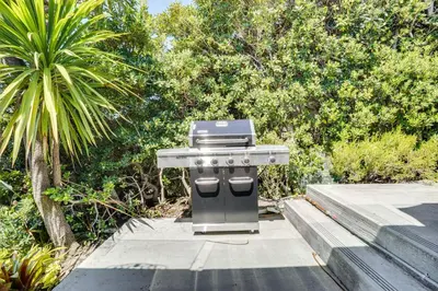 a barbecue grill sitting on top of a sidewalk at Belle View Laguna Beach Getaway with Patio in Laguna Beach