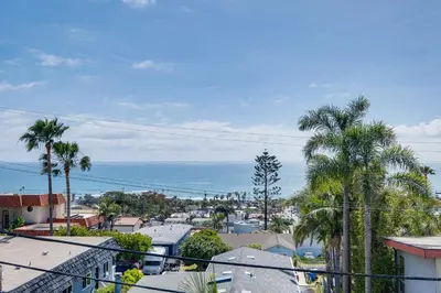 a view of a city with palm trees and the ocean at Cardiff Retreat with Game Room and Deck, Near Beach in Cardiff-by-the-Sea