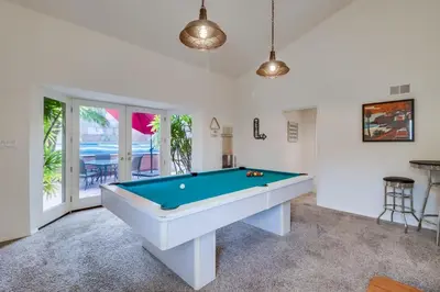 a living room with a pool table in it at Ocean & Bay Views Pool & Hot Tub Rooftop Patio in San Diego