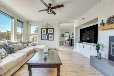 a living room with a couch and a tv at LA COSTA Valley Newly Remodeled Gem in Carlsbad