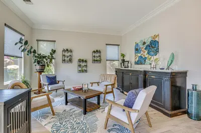 a living room with chairs and a table at LA COSTA Valley Newly Remodeled Gem in Carlsbad