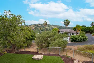 an aerial view of a yard with a house at Fallbrook's Finest Hideaway in Fallbrook