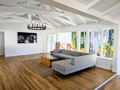 a living room with a couch and a table at La Jolla Retreat in San Diego