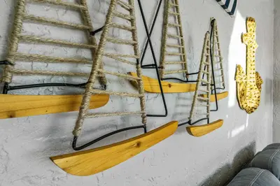 a group of wooden boats hanging on a wall at Bankers Hill Hideaway with AC Views and Parking in San Diego