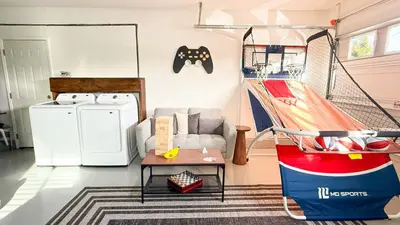 a living room with a couch and a table at Oceanside Oasis - King Bed, Pet Friendly, Fire Pit in Oceanside