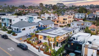an aerial view of a city with houses at Steps to BeachShops Oceanview Hot TubFirepit Moonlight Modern by AvantStay in Encinitas