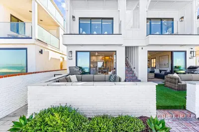 a rendering of a house with a patio at Luxury Ground N Oceanfront Unit with Patio Lounge in San Diego