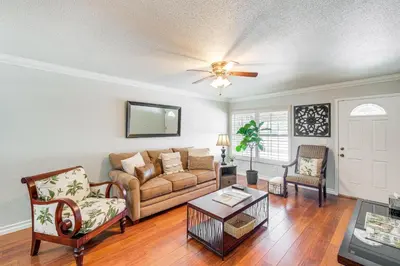a living room with a couch and a table at Peaceful Poway Vacation Rental Near Shops and Dining in Poway