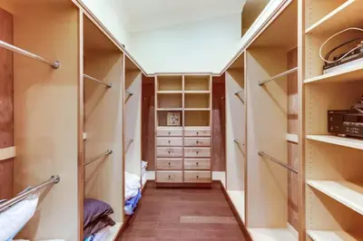 a walk in closet with lots of closets at Gorgeous Private Estate with Pool & Pickleball Court in Lakeside