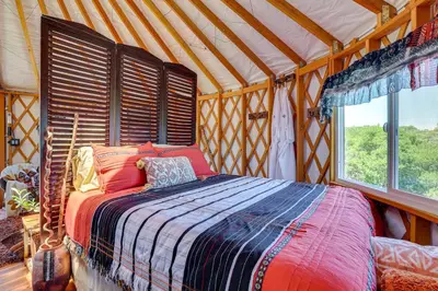 a bedroom with a bed in a tent at Mystical Mongolian Yurt in Fallbrook with Views! in Temecula