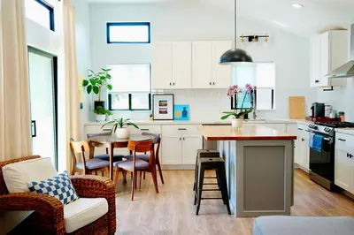 a kitchen and dining room with a table and chairs at Private Family Friendly Guest Home in San Diego