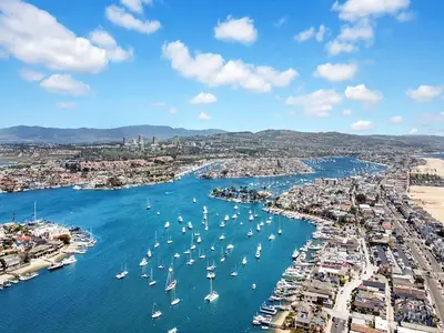 an aerial view of a harbor with boats in the water at 1101 W Bay Ave in Newport Beach