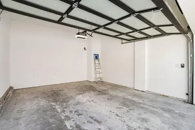 an empty garage with a ladder in it at 1628 West Oceanfront Oasis 4,5,6,7,8,9 in Newport Beach