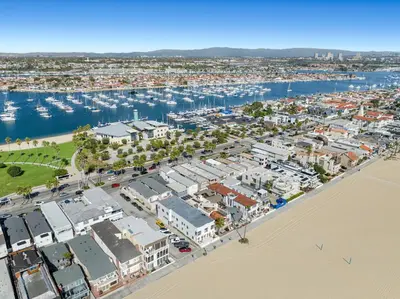 an aerial view of a harbor with a marina at 1628 West Oceanfront Oasis 3 in Newport Beach