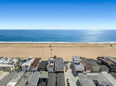 an aerial view of a beach with houses and the ocean at 1628 West Oceanfront Oasis 9 in Newport Beach