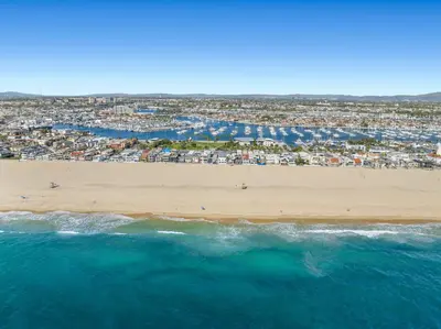 an aerial view of a beach and the ocean at 1628 West Oceanfront Oasis 5 in Newport Beach