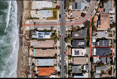 an aerial view of a street with houses next to the ocean at Upscale Beach Cottage a Block to the Beach Sauna in Encinitas