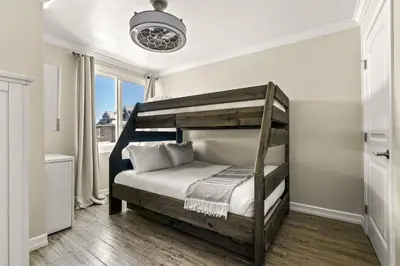 a bedroom with a bunk bed and a window at Mission Beach Marvel in San Diego