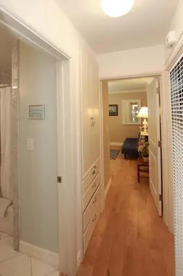 a hallway with a door leading to a living room at 1009 W Bay in Newport Beach