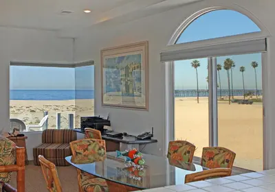 a living room with a view of the beach at 1023 E Balboa B in Newport Beach