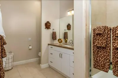 a bathroom with a sink and a shower at Luxurious Mansion in Wine Country in Temecula