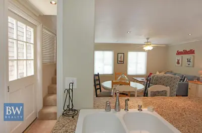 a kitchen with a sink and a living room at 3 Bedrooms in Newport Beach
