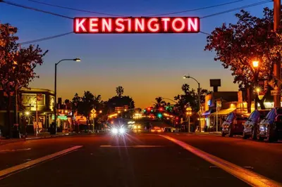 a sign that reads kisenvention on a city street at Stylish 1Br Retreat With Garage AC Close 2 Everything in San Diego