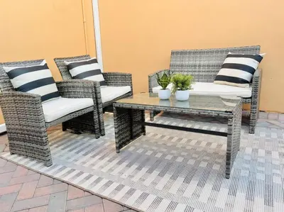 two wicker chairs and a table on a patio at Stylish 1Br Retreat With Garage AC Close 2 Everything in San Diego