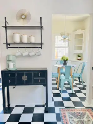 a dining room with a desk and a table at Elegant 3Br Home with AC, Parking, & Close 2 Everything in San Diego