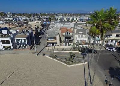 an aerial view of a city with houses and palm trees at 2314 W Oceanfront A in Newport Beach