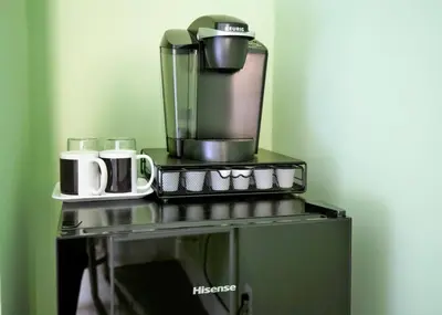 a coffee maker sitting on top of a table at PRIVATE La Jolla Guest Suite in San Diego