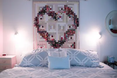 a heart quilt hanging above a bed in a bedroom at 327 Alvarado Pl in Newport Beach
