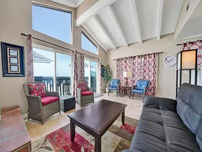 a living room with a couch and chairs at 3607 Seashore Dr B in Newport Beach