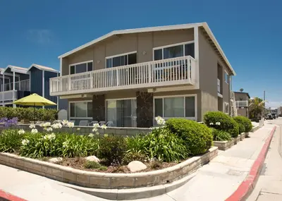 a apartment building with a balcony on a street at 3612 Seashore Dr in Newport Beach