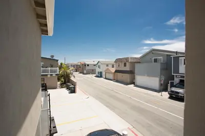 a street view from a balcony of a street with houses at 3612 Seashore Dr in Newport Beach