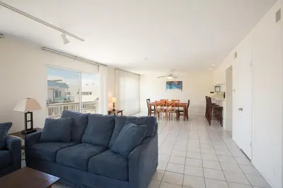 a living room with a couch and a table at 3612 Seashore Dr in Newport Beach