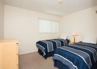 a hotel room with two beds and a window at 3612 Seashore Dr in Newport Beach