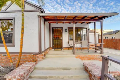 a patio with a pergola on a house at Sail Bay Dream - Steps to the bay! in San Diego