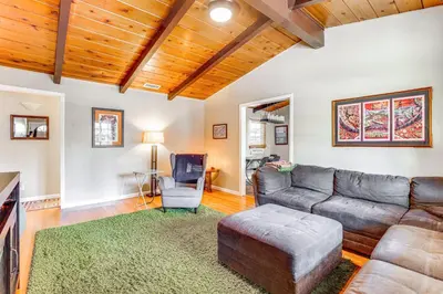 a living room with a couch and a chair at Peaceful Vista House with Gas Grill 1 Mi to Dtwn! in Vista