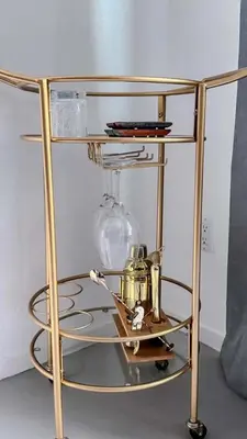 a glass shelf with a clock on a table at Beautiful Loft in Little Italy SD with Parking in San Diego