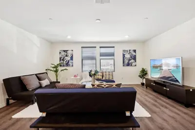 a living room with a couch and a table at Entire Private Home with 5 Bedrooms 3 Bathrooms, 3000 sqft, Gated Yard, Garage, Nice View, Available Now in Menifee