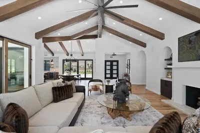 a living room with a couch and a table at Villa Rosa in Temecula