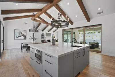 a kitchen with a counter top and a dining room at Villa Rosa in Temecula