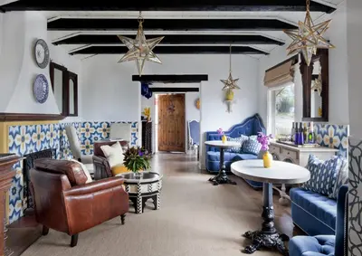 a living room with blue furniture and stars on the ceiling at Casa Laguna Hotel & Spa in Laguna Beach