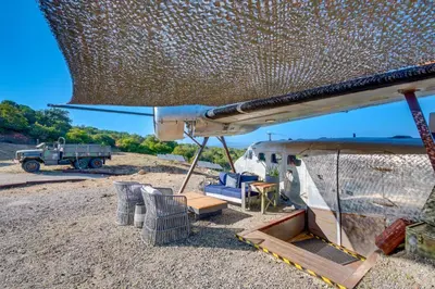 a tent with chairs and a table and a truck at Fallbrook Airplane Home with Fire Pit and Mtn Views! in Temecula