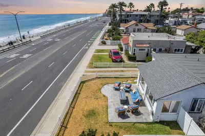 an aerial view of a house next to the beach at Carlsbad Blvd Villa in Carlsbad